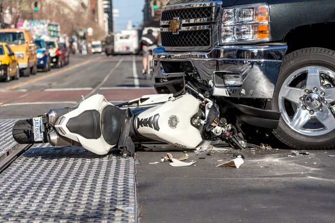 Motorcycle ran over by truck in California