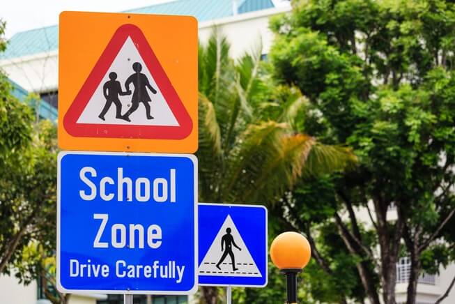 School zone caution sign