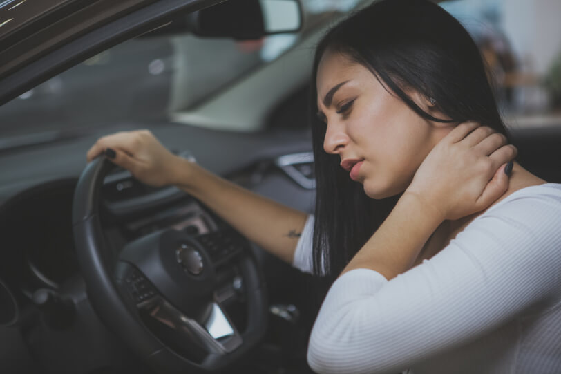 Women suffers from Whiplash after a car accident